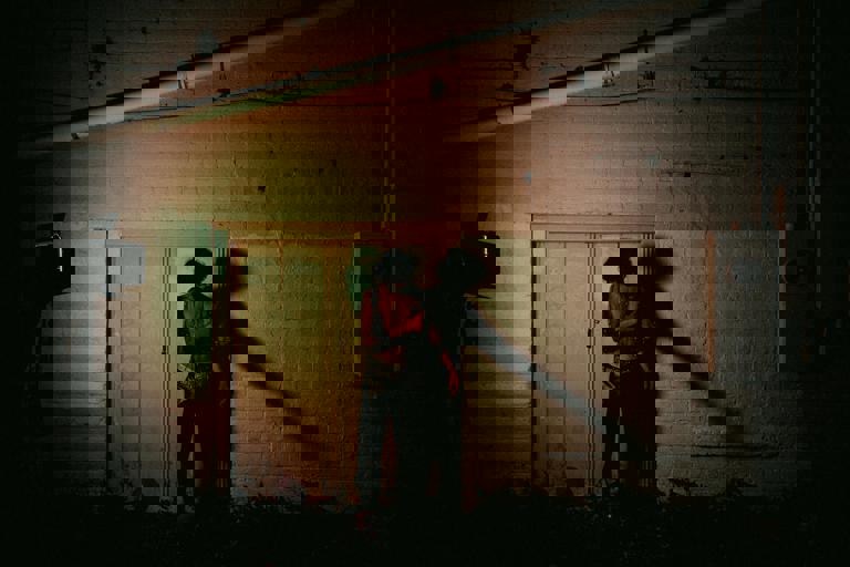 Old Phone Booth Sparks Curiosity After Years Hidden Behind City Building